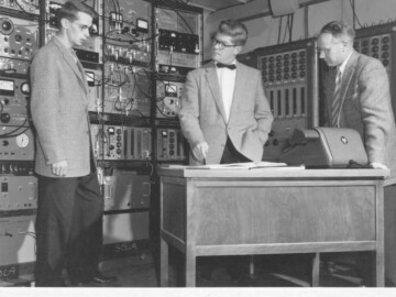 Three very prominent CRNL physicists. Photo ~1953 in control room of 3 MV machine. Kuehner went on to lead a lab at McMaster while Bromley (who grew up in the Ottawa Valley) later led a lab at Yale University and served as Scientific Advisor to the President of the USA. Almqvist, who played a key role the development of research accelerators at CRNL unfortunately passed away prematurely after a long illness in 1965. Photo source - AECL 0020L1000