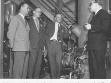 J.C. Horsman explaining mock-up of equipment used