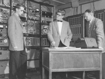 Computers have played a crucial role within the nuclear industry for theoretical and design calculations, for data acquisition and handling and for control systems. The photo above shows the status of data acquisition and “computing” about 1950. L-R: J. Kuehner, A. Bromley, E. Almqvist. A. Bromley stated the following: "My research group in the Control Room for the Chalk River 4 MV Van de Graaff accelerator. All of the instrumentation was vacuum-tube based and behind us on the right was a 50-channel multi-channel analyzer, each channel of which had to be separately adjusted at least once a day because the circuitry drifted continually. Our only local laboratory computer at the time was the Marchant desk unit shown here."<br /><br />Photo source – AECL. 101-1000