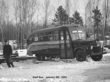 First Staff bus. Under winter conditions the frozen ground along the new road was able to support some vehicles and by January 1945 a “staff bus” was able to make it to the Plant site.Photo source – AECL. 102-1000