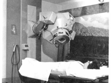 This unit succeeded the Theratron B and its modification, Theratron F (not shown). It was introduced in the late 1950s to fill the need for a fixed-field, high-output and long treatment distance unit.
<br /><br />
Photo and description source – AECL Review, April 1968. 103-1000