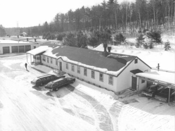 Limo and Car service. In addition to the buses, NRC (later AECL) operated a small fleet of cars and one or two limousines that were used for a variety of purposes. In the early days the main route to the outside world from Chalk River was via the passenger trains that then ran reasonably frequently. Passengers would be transported to and from Deep River to the Chalk River train station by the Company. Newly-hired employees were met at the Chalk River station by a driver and car. These vehicles were also used for touring important visitors, transporting personnel to same-day meetings in Ottawa as well as ferrying staff or visitors to the Pembroke airport. There was also a shuttle service that ran several times a day from the Plant to Deep River and could be used by staff for doctor or dental appointments etc. This writer, who was on the list of blood-donor volunteers, recalls being called one day to donate and was transported from the Plant to the Deep River hospital. Following the procedure the doctor on duty asked me if my preference was “gin or rye”. I responded rye and was then poured precisely one ounce from a bottle in the cupboard and told to sip it slowly over the next ten minutes after which I could leave. The Red Cross, who operated regular blood-donor clinics in Deep River, never did adopt this practise.Photo source – AECL. 107-1000