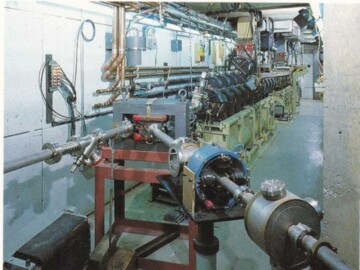A view from the high-energy end of the ETA inside the concrete shielding tunnel.<br /><br />Photo source-AECL. 107-1000