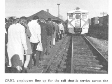 Service interruption. During the 1970s Pembroke was connected by road to Chalk River and the Plant solely by the TransCanada Highway. A critical point on this highway was the bridge across the Petawawa River in the village of Petawawa. On Saturday evening, 6 May 1972, this critical link developed a 1.3 m sag in the middle due to damage to the bridge footings. This spelled problems for the 600-700 AECL employees located on the Pembroke side of the bridge. The June 1972 issue of the AECL Review reports; “By late Sunday afternoon an arrangement had been made by CRNL with CFB Petawawa and CPR officials to bring three Budd railway cars and crews from Montreal to operate a rail shuttle service over the nearby railroad bridge which had remained intact. Bus schedules were changed to meet the emergency, company buses carrying employees from Pembroke and area to the Petawawa rail station, and other buses (ordinarily used from Deep River to the Plant) picking them up on the west side of the river.” Deep River-based employees were asked to carpool during this period. Eventually a temporary Bailey bridge was constructed over the river and life returned to normal.<br /><br />Photo source – AECL. 108-1000