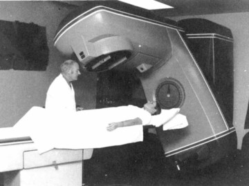 Commercial Product’s first linear accelerator for cancer therapy, a Therac 6, was installed at the London Clinic of the Ontario cancer Foundation, Victoria Hospital, in November 1975.<br /><br />Photo source and caption– AECL Review, March 1977. 109-1000