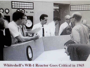 Any further details of the establishment, programs and history of the Whiteshell laboratories on this website would be poor substitutes for the excellent histories that have been written by C. Saunders et al. and that are available on line at links WL1 and WL2. The front pages of the links are reproduced below with the permission of the authors. The clipping used in the nine pictures above were all collected by members of the Whiteshell History Committee for the 50th anniversary of the Whiteshell laboratories.
Photo source – AECL. 112-1000