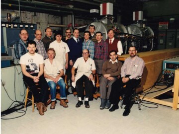 The PETRA accelerator contribution. In the mid-1980s the Canadian high-energy physics community, with funding provided by the Canadian Natural Sciences and Engineering Council (NSERC), agreed to an arrangement whereby individual countries participating in the construction of the internationally-funded HERA proton-electron collider to be built in Hamburg, Germany, would provide “in-kind” contributions of accelerator hardware. AECL, and the Accelerator Physics Branch in particular, was chosen by NSERC to provide this hardware under a commercial contract. The photo taken in February 1990 just before shipping to Germany shows the group involved with the design, construction and commissioning of one of the two AECL-built, Canadian contributions to HERA. . L-R (seated); N. Griffith, R. Bakewell, J. Weaver, B. Burton, D. Proulx. (standing); R. Kelly, K. McKee, P. Bunge, J. Balfour, A. Hood, R. West, S. Craig, M. de Jong, R. Hutcheon and W. Funk.<br /><br />Photo source-AECL. 116-1000