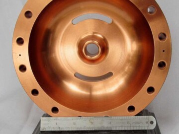 An IMPELA segment. This segment, one-half of the specially-shaped radiofrequency resonant cavities, was presented as a retirement gift to J. McKeown. It has been donated to the Society.
<br /><br />
Photo source-The Society. 119-1000