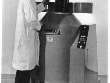Gammacell 200 and 220 units were developed and sold to industry and research establishments. The first units were introduced about 1958 and over the next decade over 100 units were sold. The units were self-contained and required no external shielding. A series of higher dosage units under the name of Gammabeam was also developed and sold for applications in a shielded room.
<br /><br />
Photo source and caption– AECL Review, June 1968. 120-1000-1