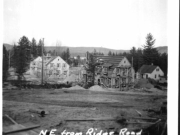 Construction extending further west in town. View on 04 November 1945 from Ridge Road looking at Alder. Photo Source – AECL. 1211000