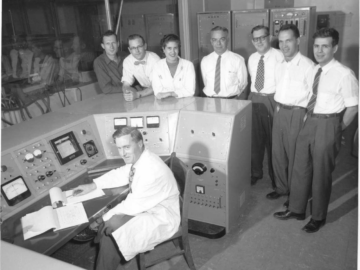(Seated) Charles Mann, Standing (L-R); D. Craig, G. Keech, L. Larson (nee Vidal), W. Henderson, D. Walker, T. Rogers, and D. Renwick (Canadair Ltd.) Pool Type Reactor (PTR) goes critical: 29 November, 1957