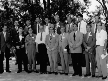 CRNL participants underlined. Back, L-R: W.T. Sharp, E.W. Vogt, V.F. Weisskopf, B.H. Flowers, D.R. Inglis, B.B. Kinsey, H.E. Gove, R.L. Graham Front, L-R: E.B. Paul, D.A. Bromley, A. Bohr, A.P. Komar, W.B. Lewis, R.E. Peierls, R.F. Taschek, G.A. Bartholomew, L.G. Elliot (Photo Source – D. McElroy, daughter of R.L. Graham) Organizing committee for the 1960 International Conference on Nuclear Structure, Kingston