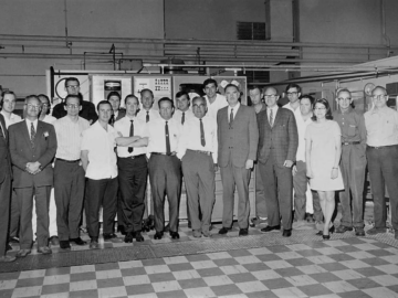 L-R: John Melvin, Ted Burgoyne(?), Jim Harrop, Doug McLeod, Bill Cargo, Michel Pettigrew, Gerry ?, George Doubt, Frank Devine, Bob Watson, Don Dixon, Len Laplante, Eric Trapp, Hank Gentili, Cecil Rhodes, Norm Russell, Stan Whittaker, Dave Parker, Brian Cotnam(?), June Falkenham (nee Stewart), Harry Schrader, Kevin Roche, Kathy ?. Mechanical Equipment Development Branch, June, 1969