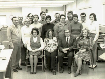 Back Row: (L-R)- Roly Desjardins, Don Alwright, Wayne Baker, Joe Yeatman, Dave Payer, Carson Millard, Mary Edwards Middle Row: Dyer Code, Joyce Olmstead, Werner Eichberg, Ruth Donnelly, Francis Boyer, Colleen Payer Front Row: Irene Lesage, Neirdre Stewart, Maurice Arvasais, Janet Clough. Print Shop, 1974